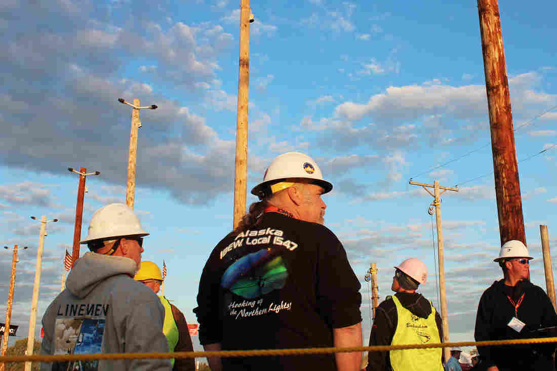 Linemen from across the country gather before the Lineman's Rodeo starts in Bonner Springs, Kan.